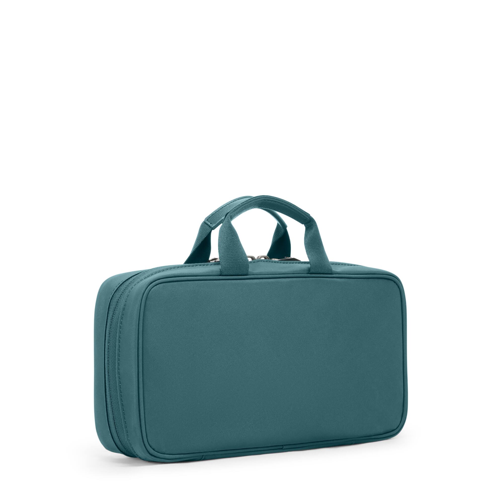 Left. TUMI - Voyageur Small Madeline Cosmetic - Lagoon.