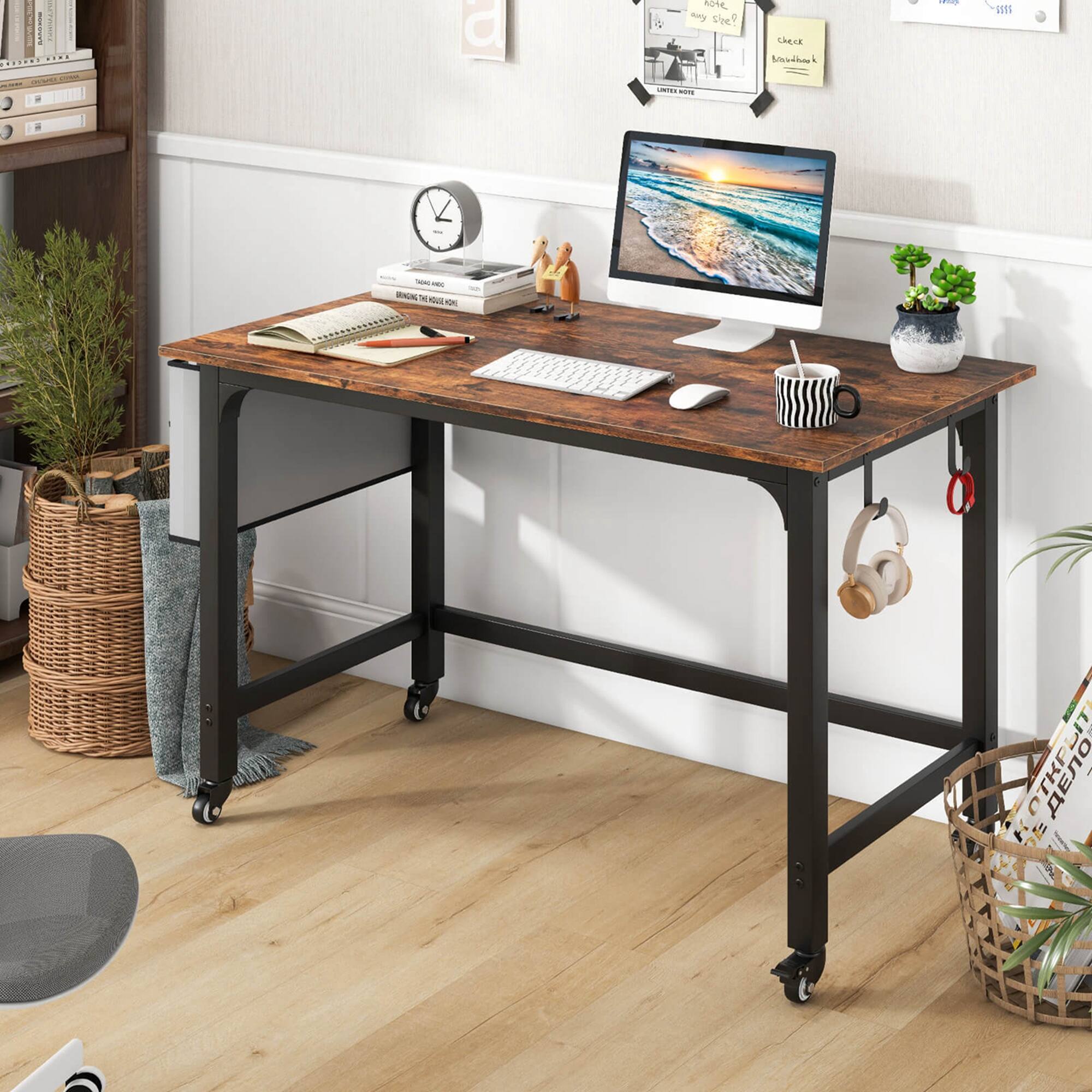 I have a desk with a computer, keyboard, mouse, and monitor. There is also a clock on the desk.