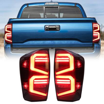 Front. AMERICAN MODIFIED - AMERICAN MODIFIED Smoked LED Tail Lights for 2016 to 2023 Toyota Tacoma, 1 Pair - Smoked lens, black housing.