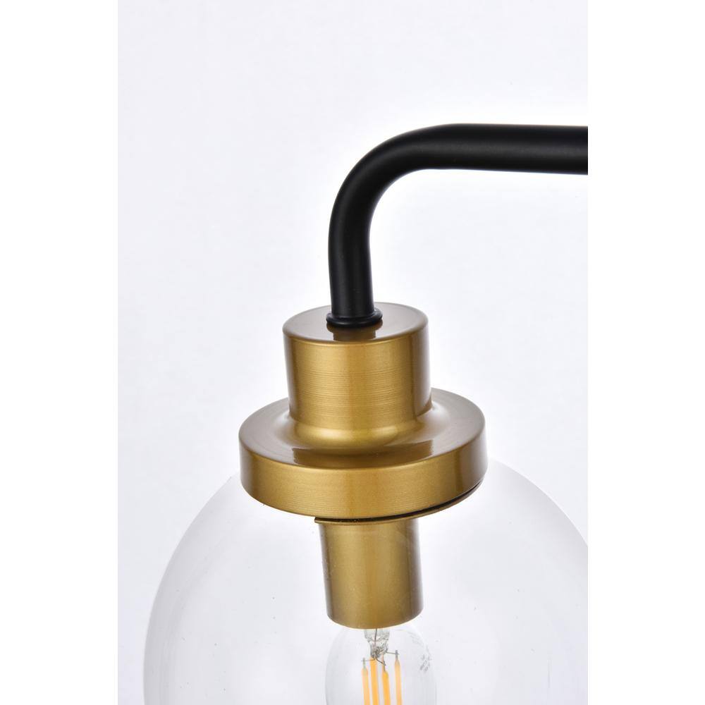 Left. Living District - Hanson 3 lights bath sconce in black with brass with clear shade - Black And Brass And Clear Shade.