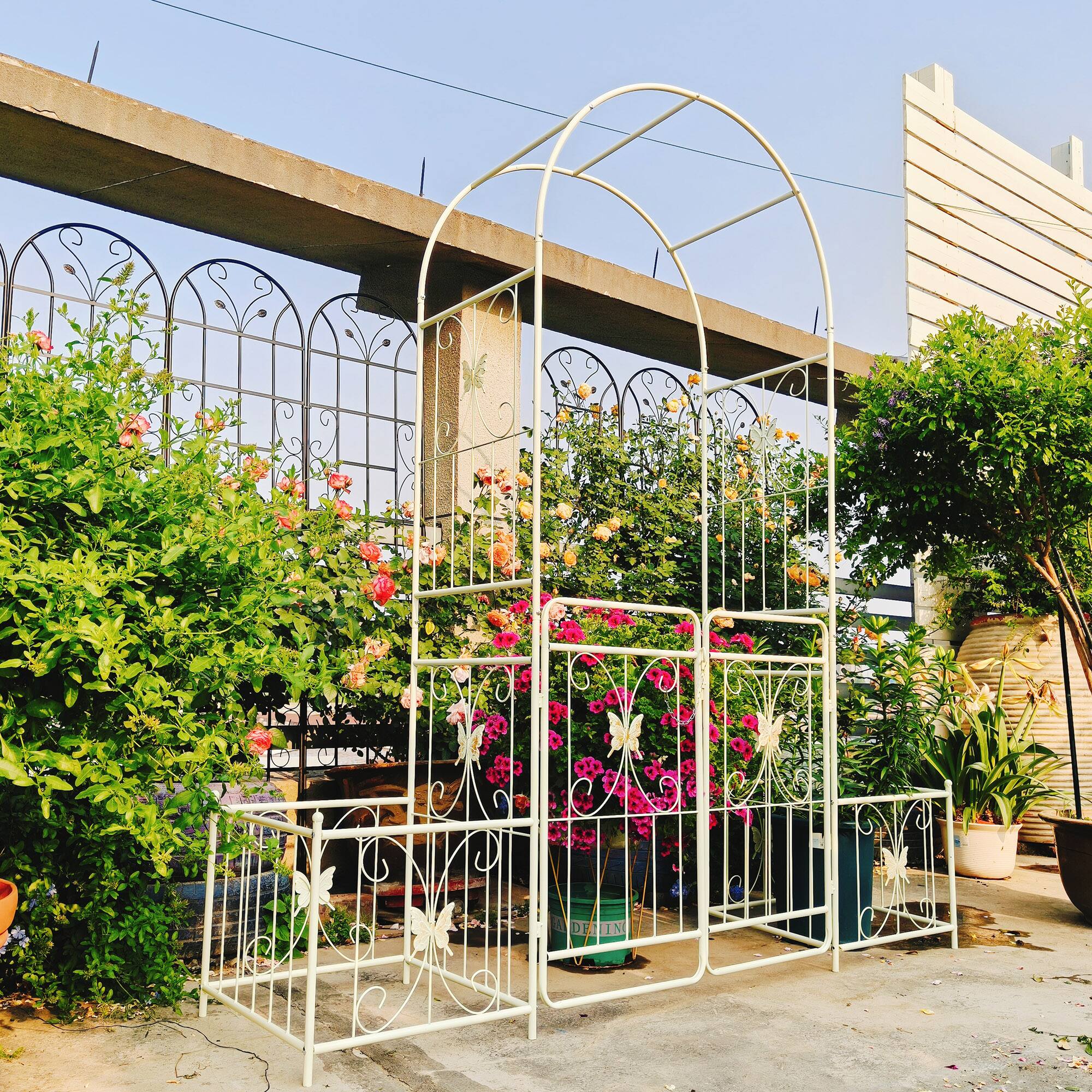 Left. Loheer - 6.63 ft W x 7.22 ft H Metal Garden Arch with Gate Rose Trellis for Outdoor Garden - Creamy White.
