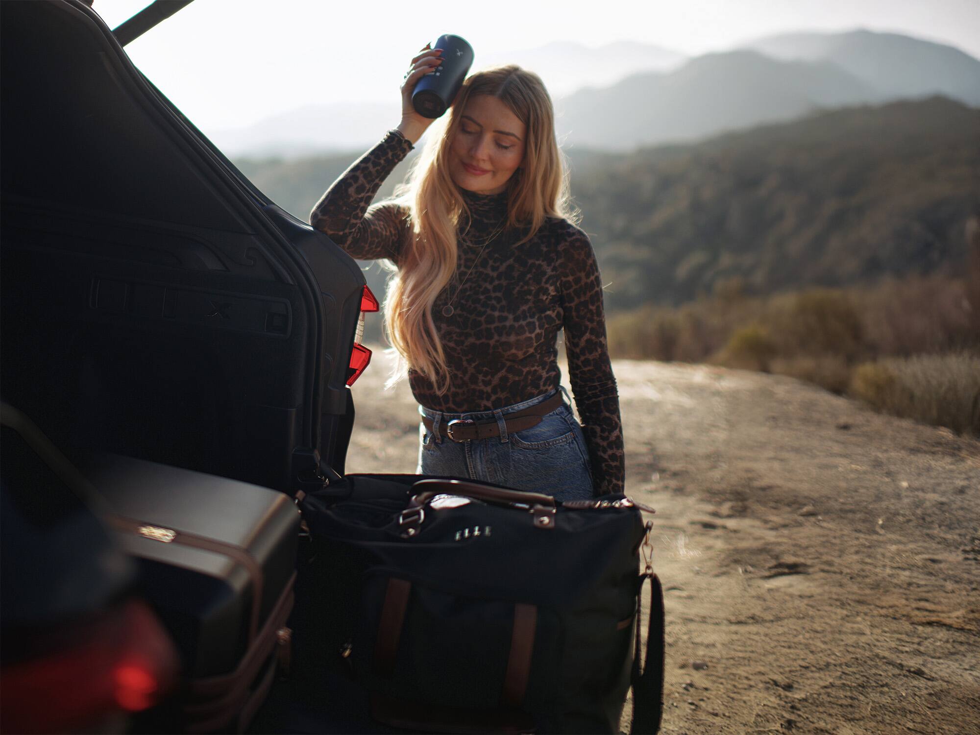 Alt View 2. Elle - ELLE Luxe Journey 30L Twill and Vegan Leather Weekender Duffel Bag | Black - Black.