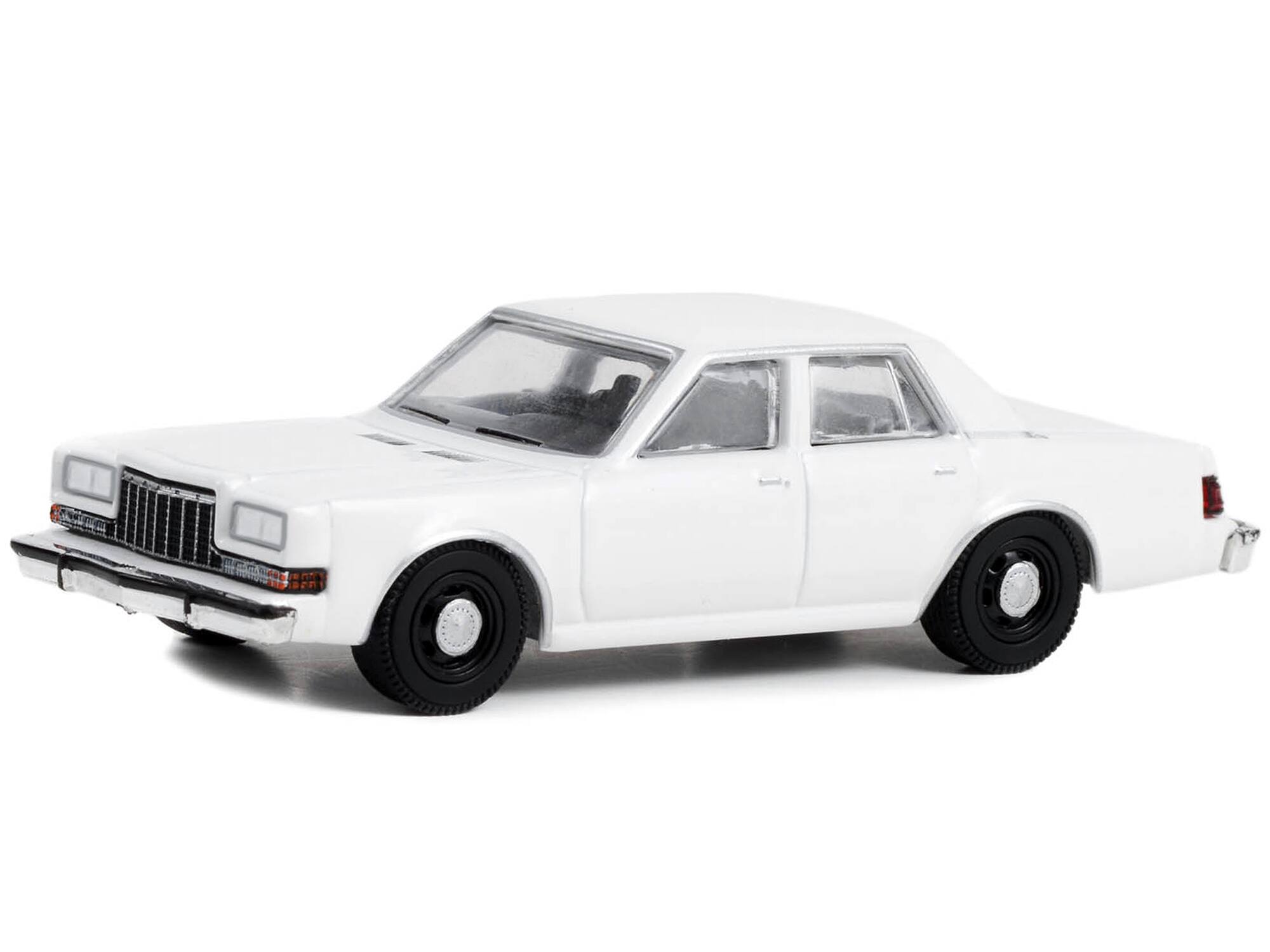 Alt View 1. Greenlight - 1980-1989 Dodge Diplomat Police Unmarked White "Hot Pursuit" "Hobby Exclusive" Series 1/64 Model Car by Greenlight.