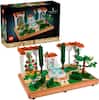 The image features a Lego set that includes a fountain garden and a display of trees. The set is designed for adults and requires 1302 pieces to complete. The box for the set is black and white, and it is displayed next to the completed Lego creation. The display showcases the intricate details of the garden and the trees, making it an impressive and visually appealing model.