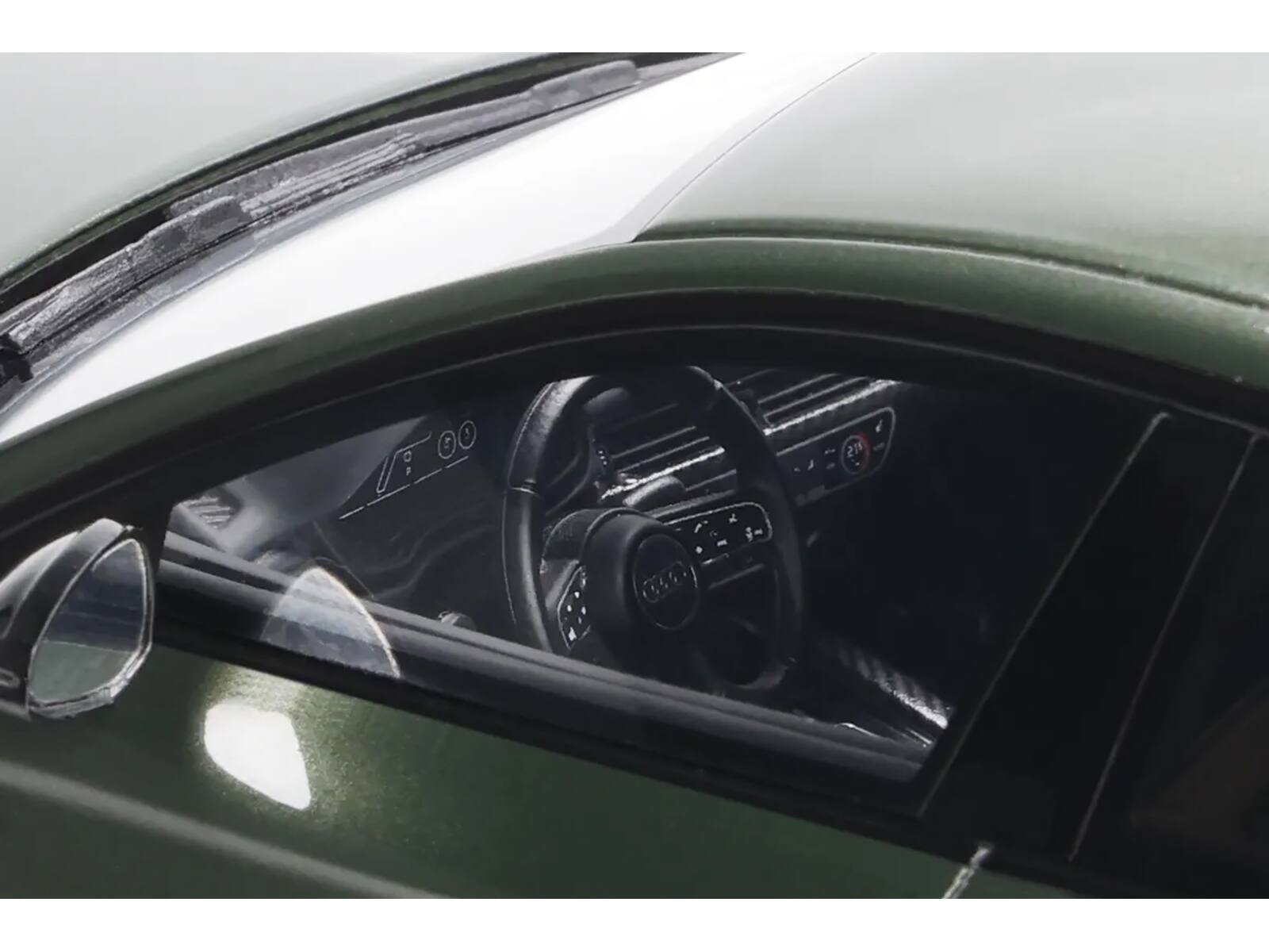 Angle. GT Spirit - 2023 Audi RS 5 Competition Dark Green Metallic 1/18 Model Car by GT Spirit - Dark Green Metallic.