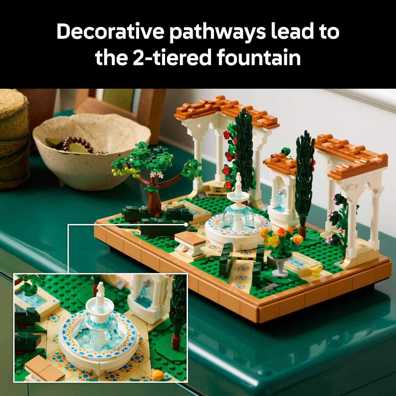 Decorative pathways lead to the two-tiered fountain.