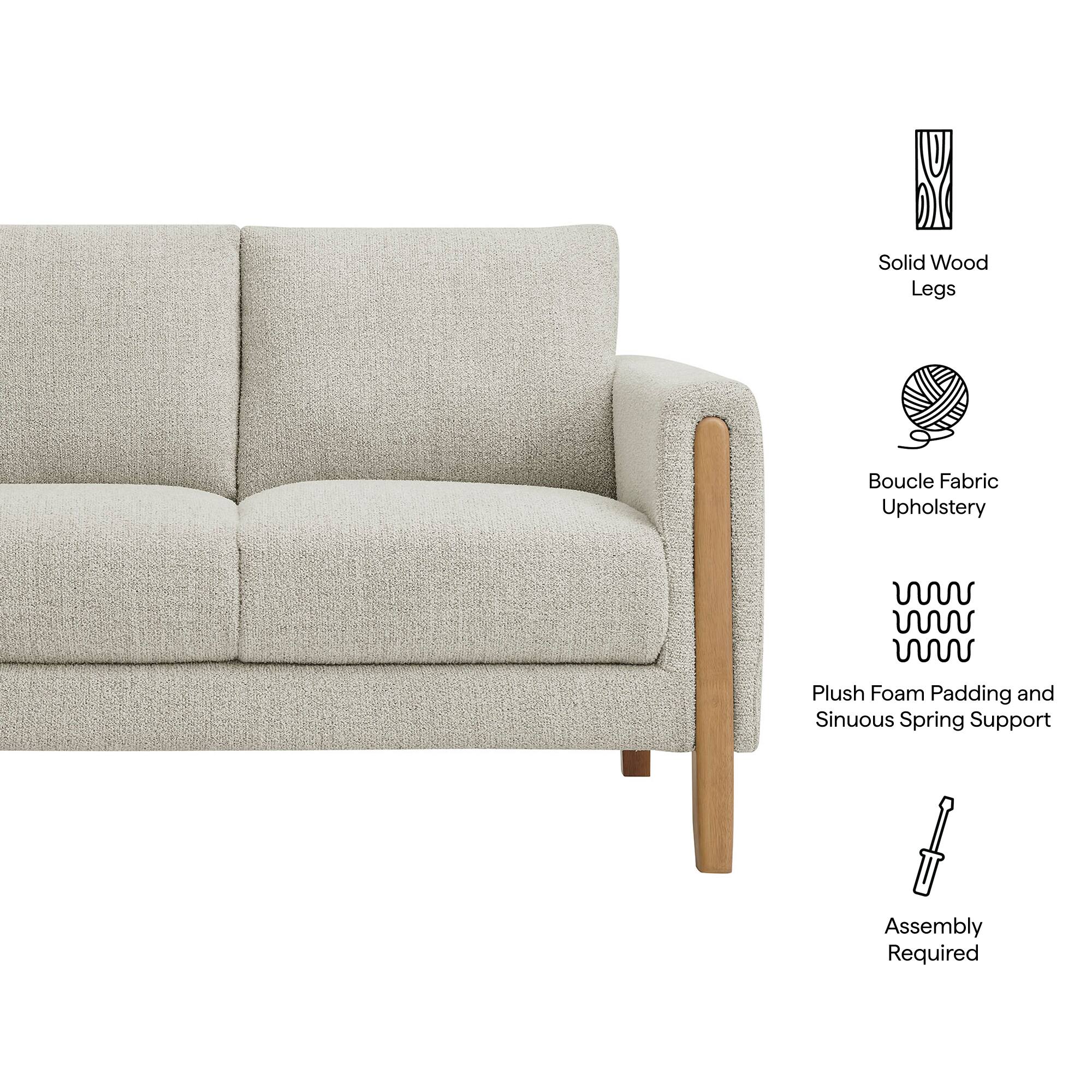 Solid Wood Legs  
Boucle Fabric Upholstery  
Plush Foam Padding and Sinuous Spring Support  
Assembly Required