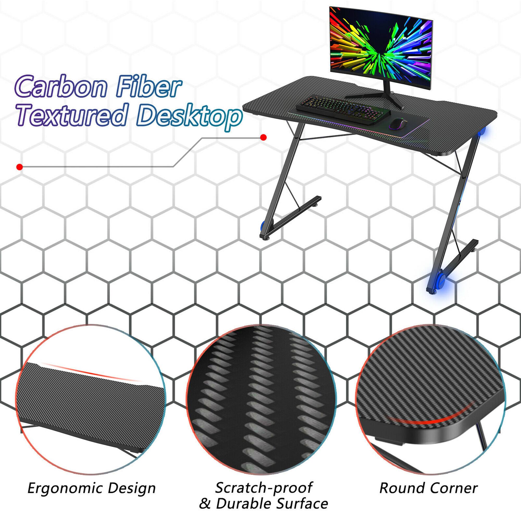 The text on the image is grouped as follows:

1. Carbon Fiber Textured Desktop
2. Ergonomic Design
3. Scratch-proof & Durable Surface
4. Round Corner