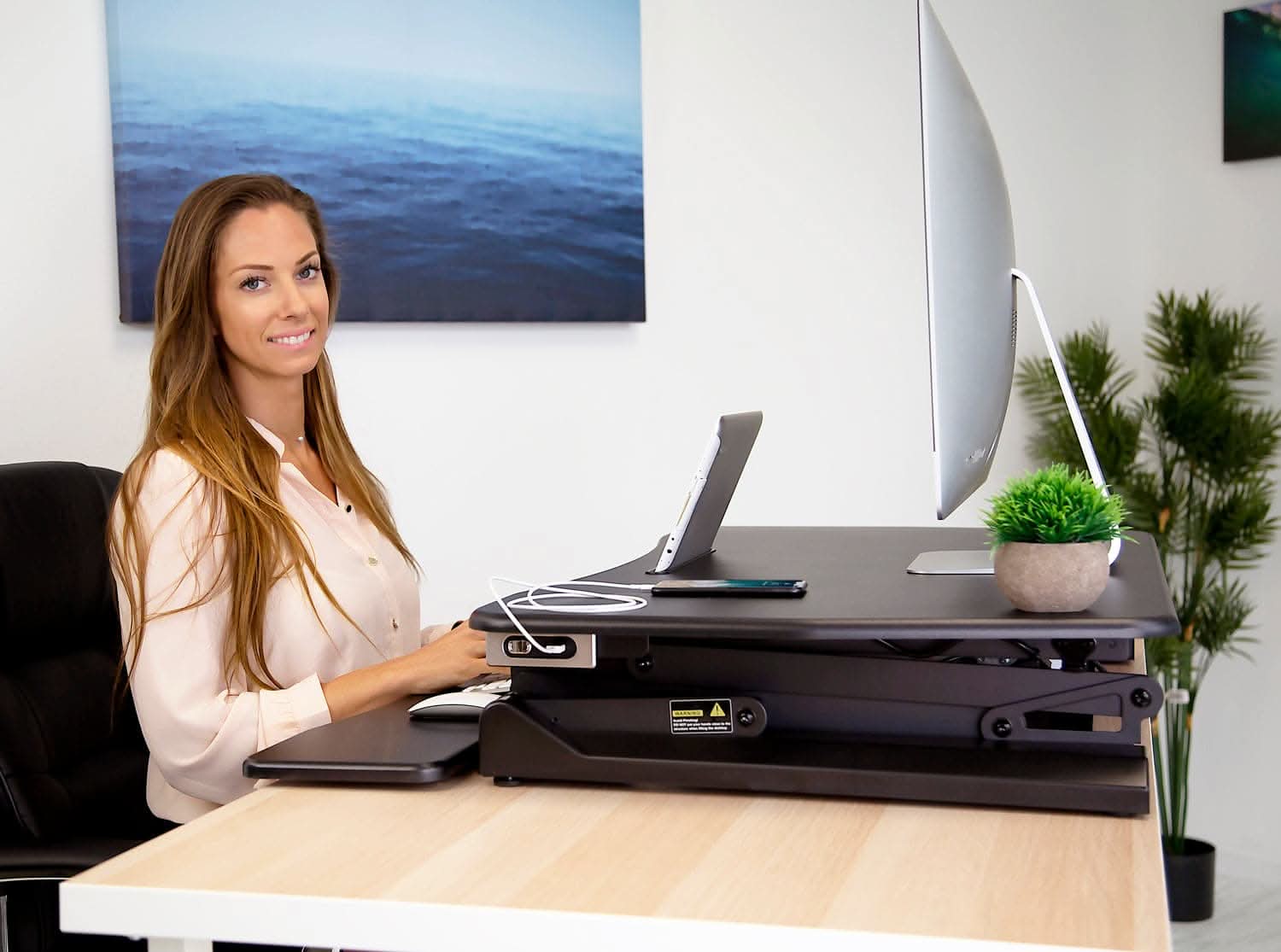 Left. Mount-It! - Electric Sit-Stand Desk Converter with One-Touch Height Adjustment and Spacious Work Surface - Black.