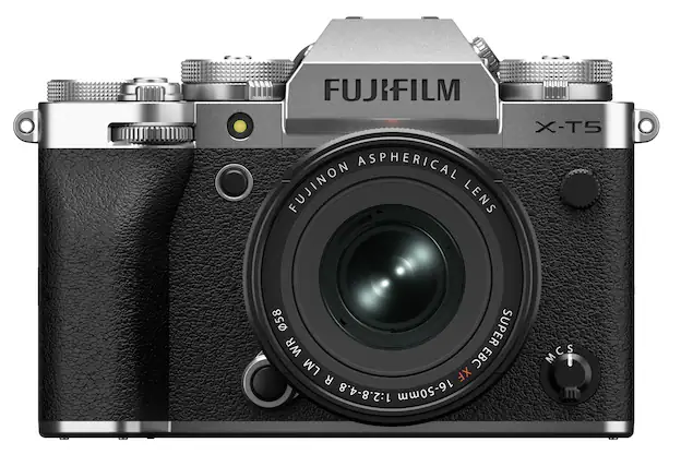 The image features a close-up of a FUJIFILM camera with an aspherical FUJINON lens. The camera is designed for the X-T5 model, and it has a 58mm super wide-angle lens with a 1:2.8-4.8 aperture. The camera is equipped with a 16-50mm MCS lens, making it suitable for various photography needs.