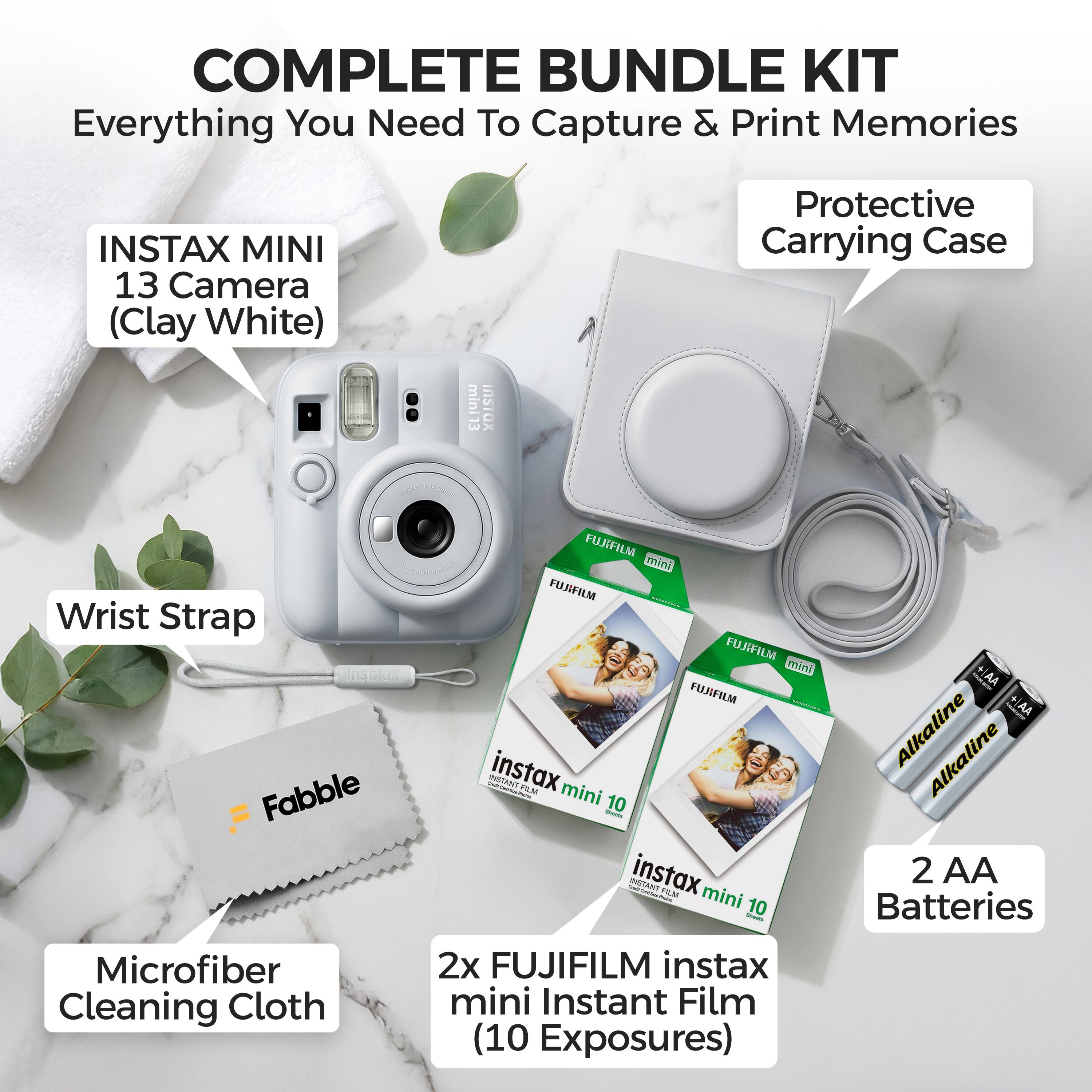 COMPLETE BUNDLE KIT  
Everything You Need To Capture & Print Memories  

INSTAX MINI 13 Camera (Clay White)  
Protective Carrying Case  
Wrist Strap  
Microfiber Cleaning Cloth  
2x FUJIFILM instax mini Instant Film (10 Exposures)  
2 AA Alkaline Batteries