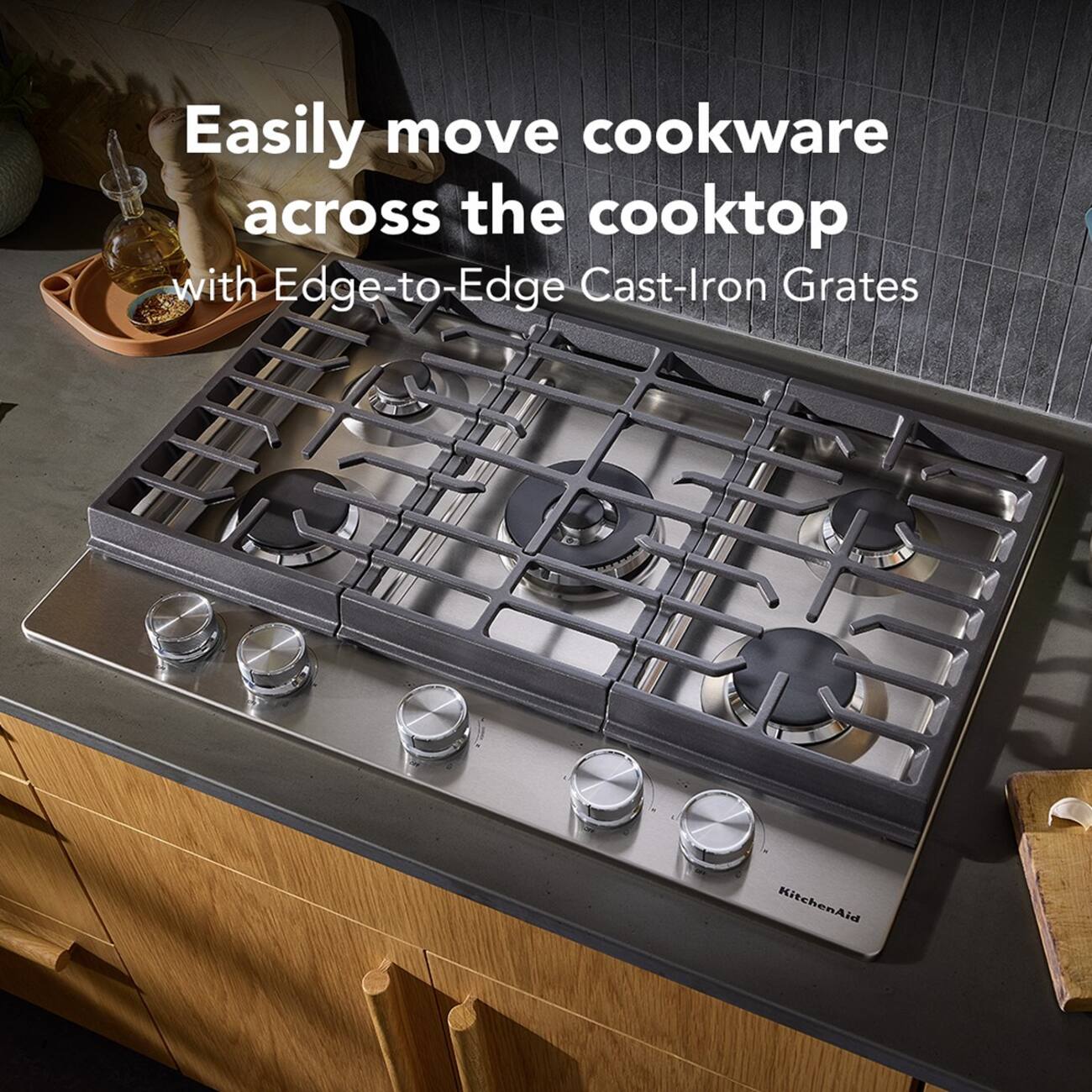 Easily move cookware across the cooktop with Edge-to-Edge Cast-Iron Grates KitchenAid