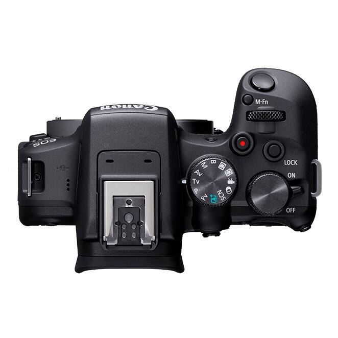 The image features a black camera with a black and silver lens. The camera has a lock on/off button, as well as a mode button with various options such as C1, C2, Tv, P, Av, and SCN. The camera also has a flash setting, which can be adjusted to suit different lighting conditions. The overall design of the camera is sleek and modern, making it an attractive choice for photographers.