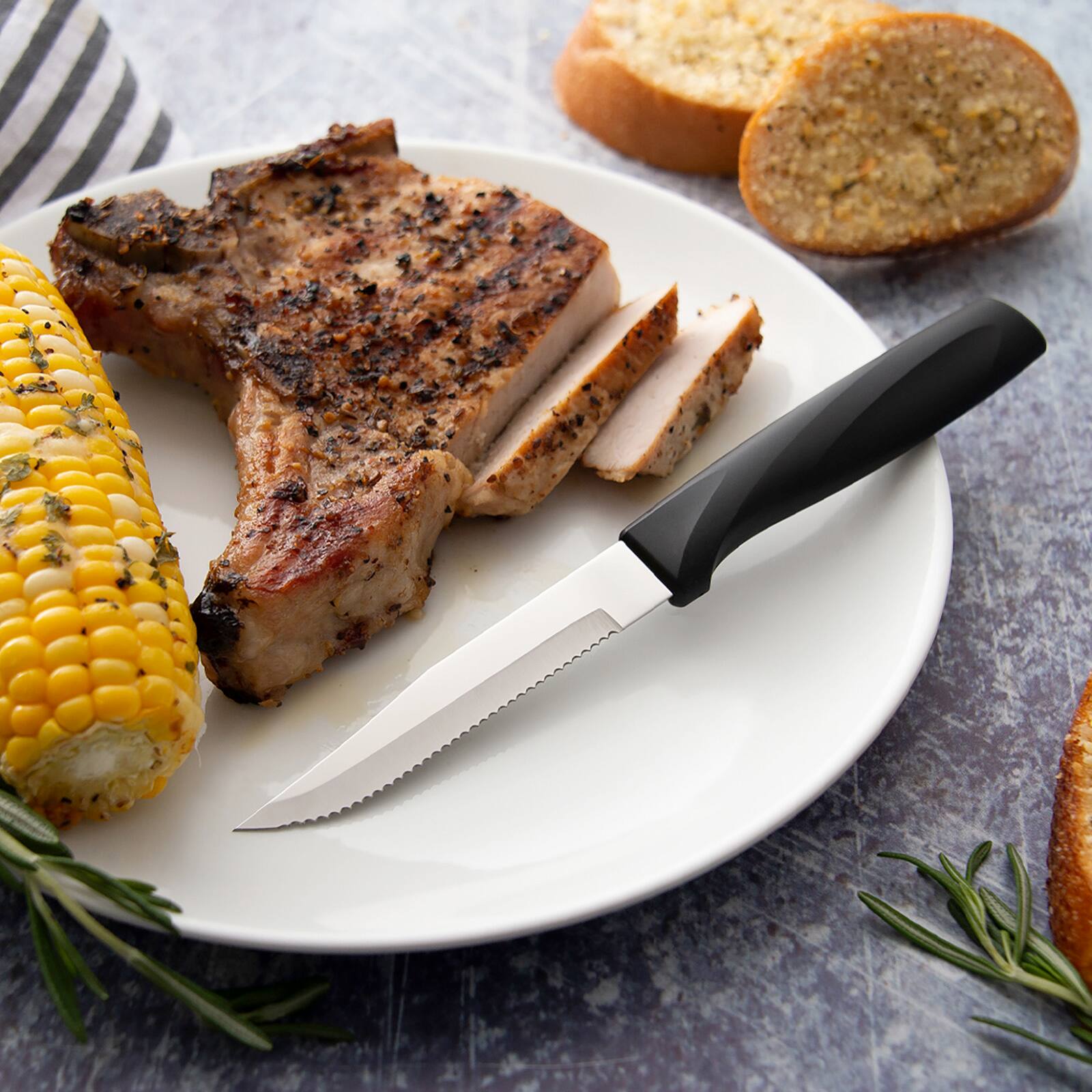 Alt View 2. Rada - Cutlery 3.875-Inch Serrated Steak Knife Anthem Wave Handle - Black.