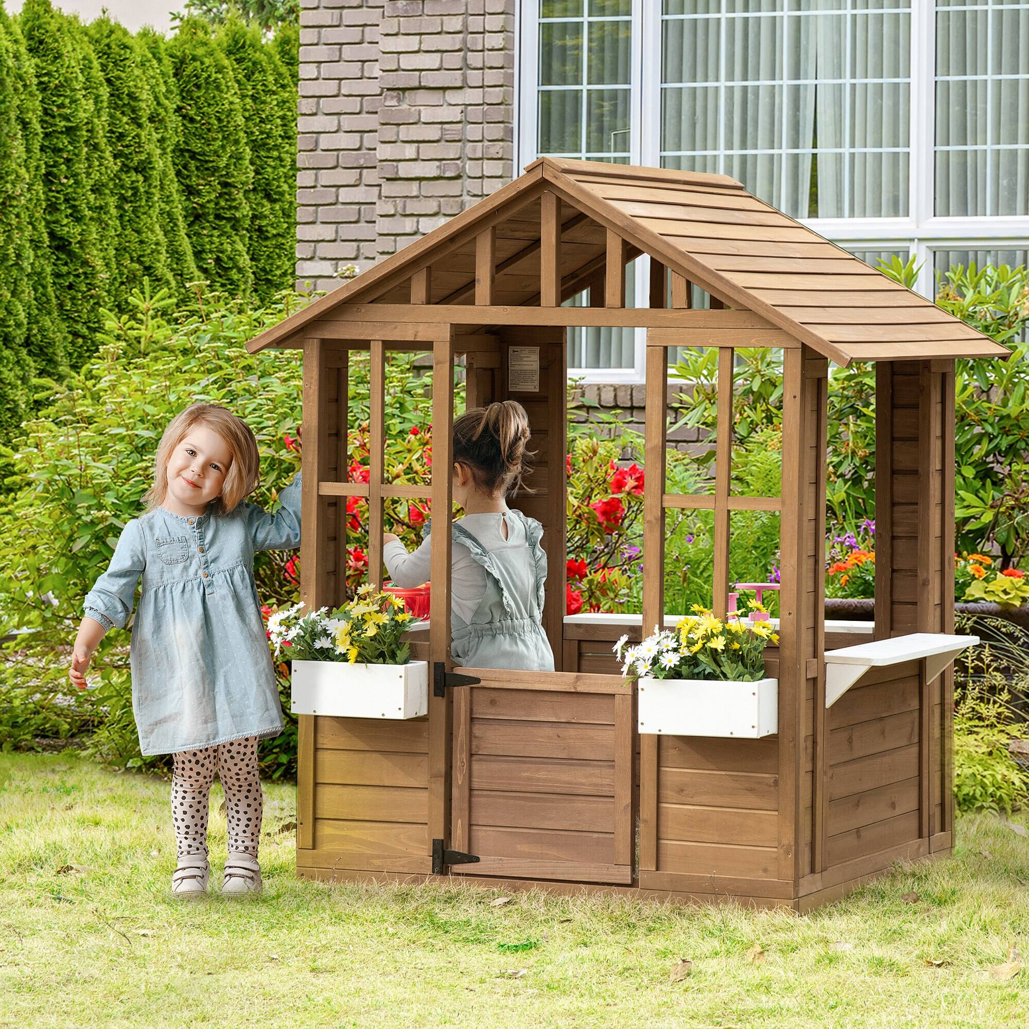 Angle. Outsunny - Kids Wooden Playhouse, Outdoor Garden Games Cottage, Working Door, Windows, Flowers Pot Holder, 47" x 38" x 54".