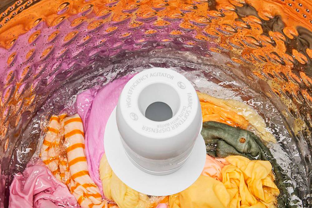 The text on the image reads: "AGITATOR EFFICIENCY HIGH FABRIC DISPENSER WATER SOFTENER."