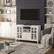 Left. Simpli Home - Artisan Solid Wood Tall TV Media Stand For TVs up to 60 inches - White.