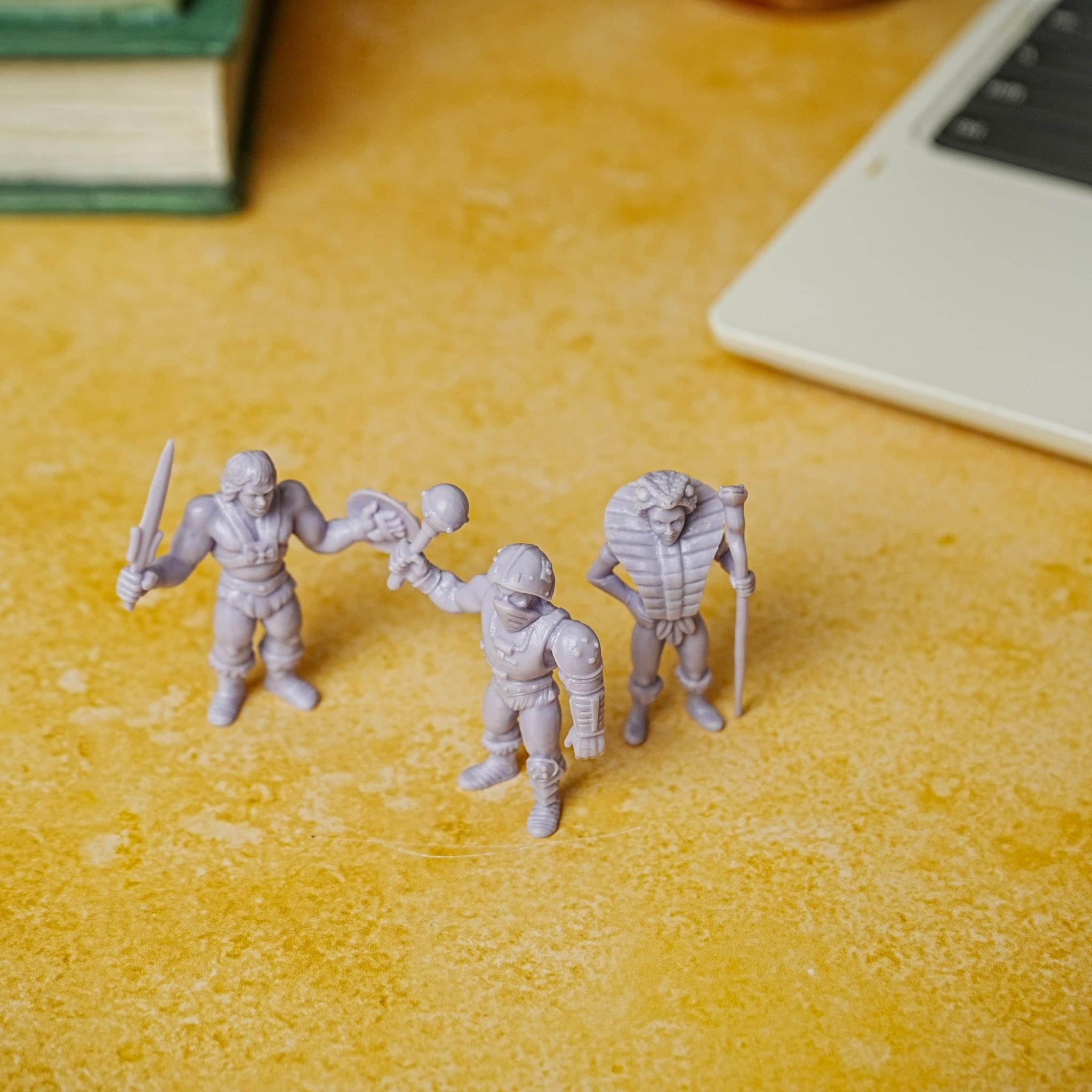 Alt View 3. Nerd Block - Masters of the Universe M.U.S.C.L.E. 3-Pack: He-Man,Teela, Man-At-Arms - Multi-Color.