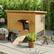 Alt View 2. FODINGHILL - Insulated Outdoor Cat House for Multiple Pets, Weatherproof Wood Shelter with Foldable Ladder & Acrylic Window, Brown.