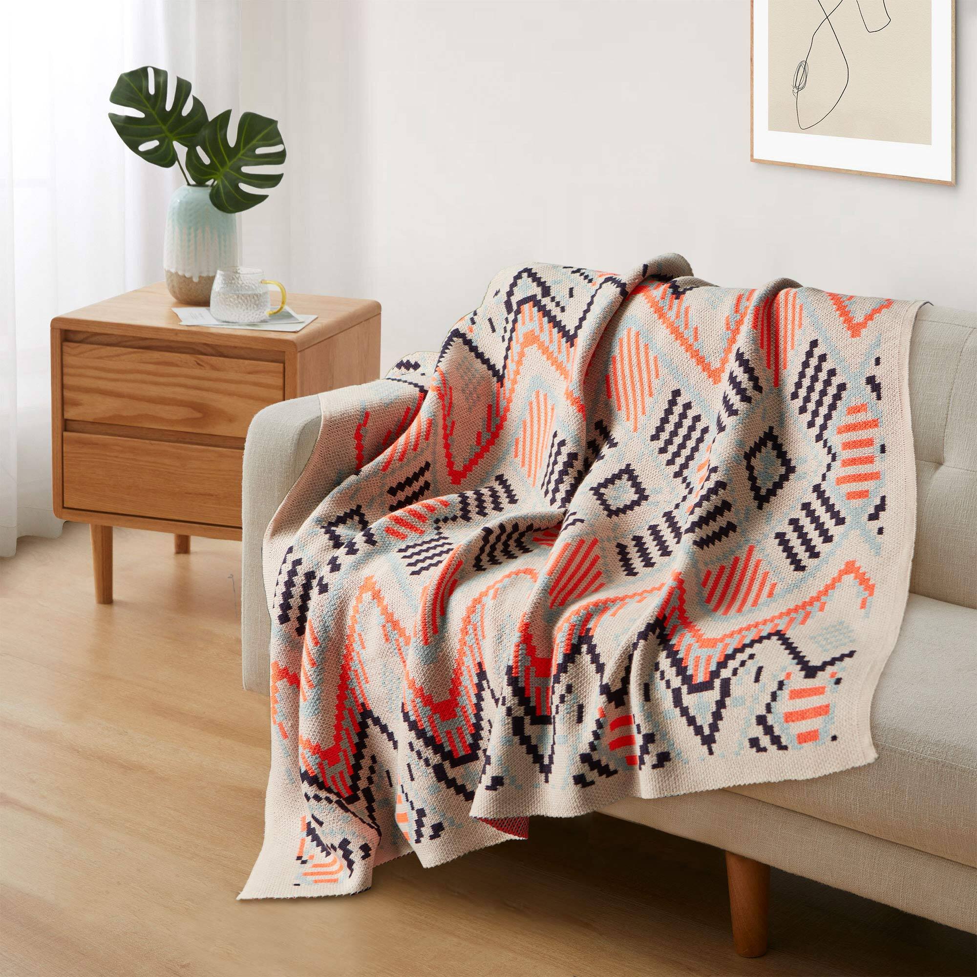 Angle. Peace Nest - Peace Nest Boho Chunky Knit Throw Blanket 50"x60", Black & Orange Wave - Black & Orange Wave.