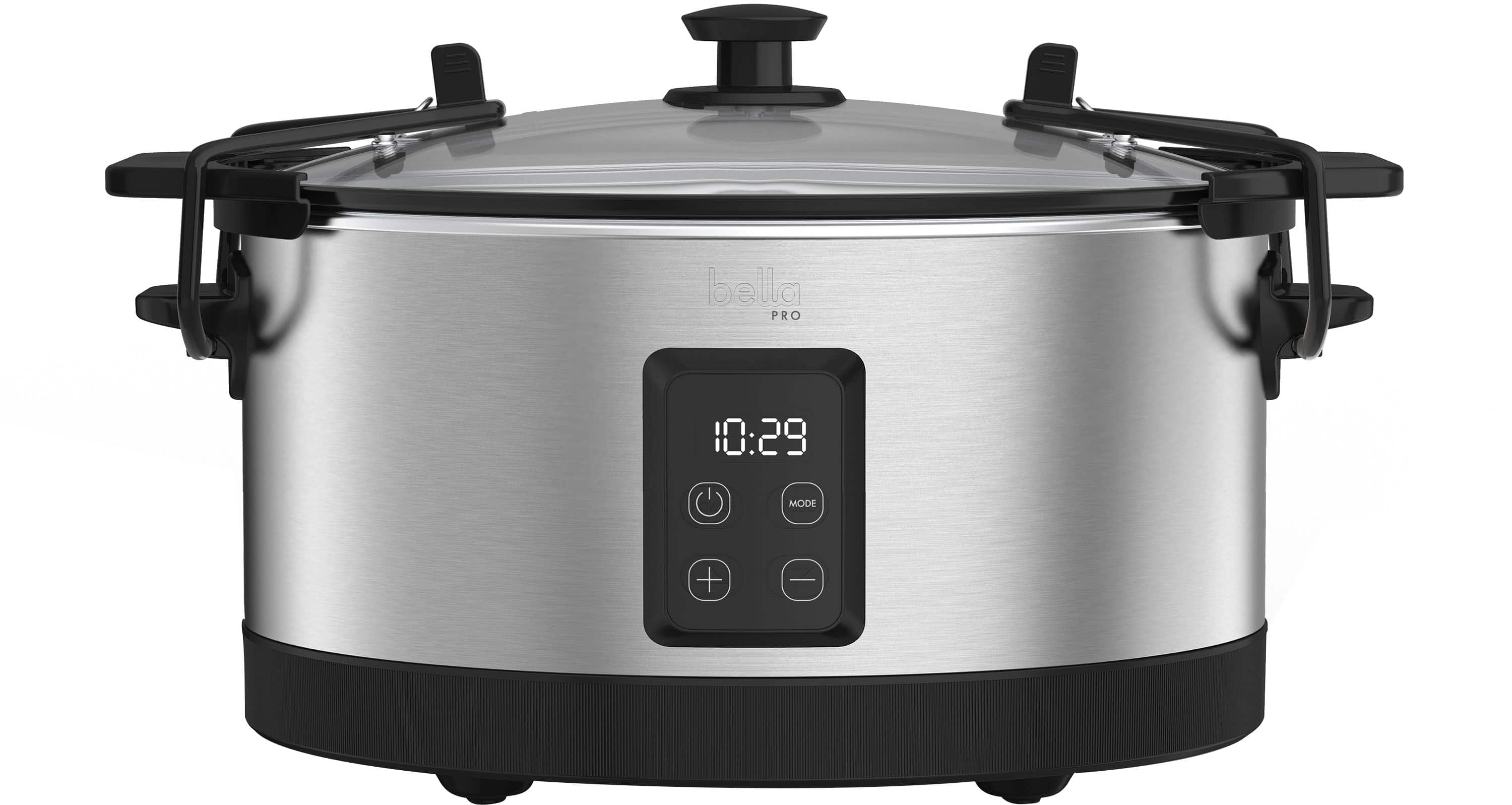The image shows a silver Bella Pro 10:29 mode + I digital display on a stainless steel pot. The pot is sitting on a stove top, and the digital display is visible on the front of the pot.