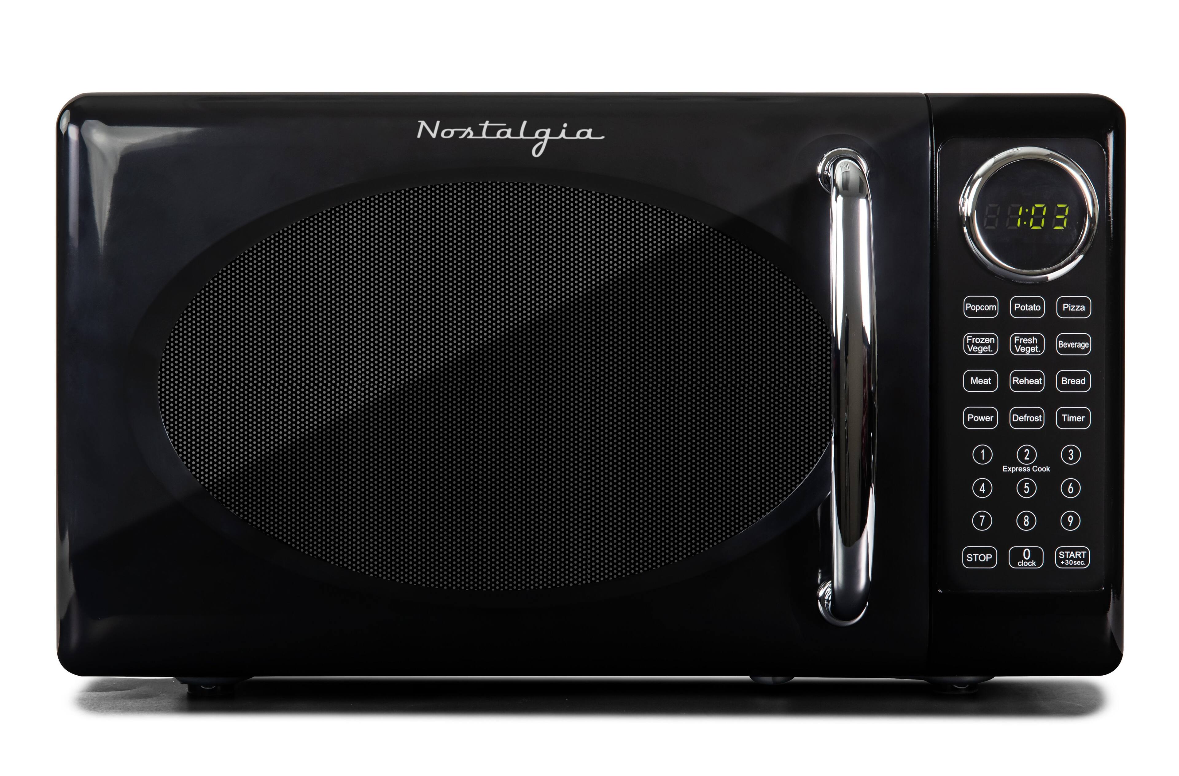 Nostalgia 1:08 B

Popcorn Potato Pizza Frozen Veget. Fresh Veget. Beverage Meat Reheat Bread Power Defrost Timer 1 4 2 Express Cook 5 3 6 7 9 STOP 0 clock START +30sec