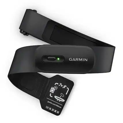 The text on the image reads "GARMIN X 7 7x S X00 O garmin.com/HRMcare". This is a description of a Garmin device, which is a brand of GPS devices and other electronic products. The device is designed to be worn on the wrist, and it likely has a built-in heart rate monitor. The text also includes a website address for the company, which is garmin.com/HRMcare.