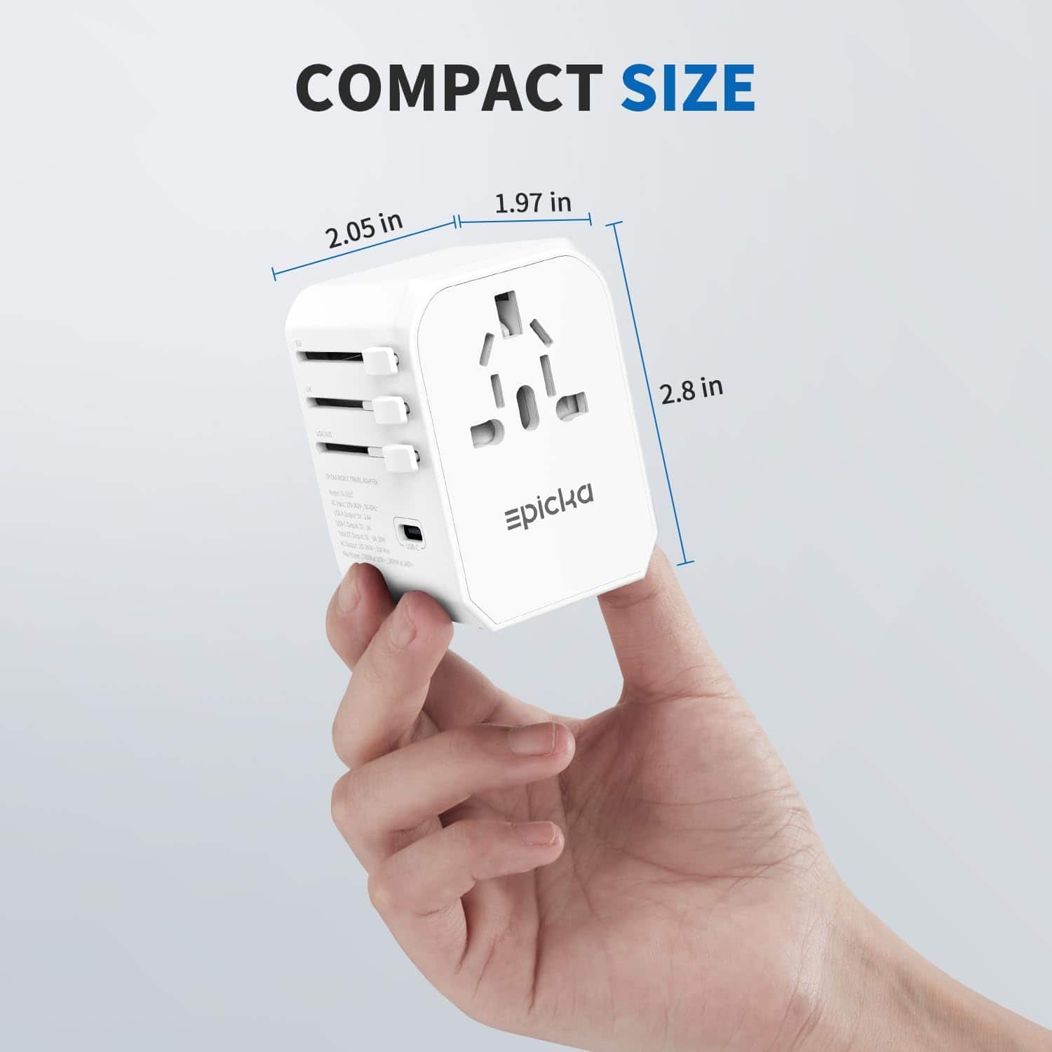 The text on the image reads "Compact Size 2.05 in 1.97 in 2.8 in Torr Epicka." This text is grouped and corrected as follows:
"Compact Size: 2.05 in x 1.97 in x 2.8 in Torr Epicka."