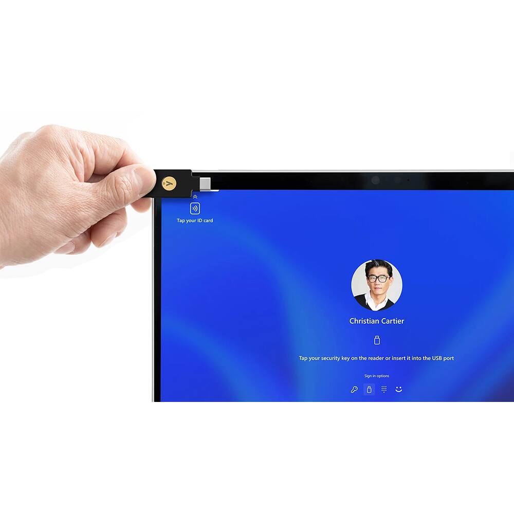 Tap your ID card  
Christian Cartier  
Tap your security key on the reader or insert it into the USB port  
Sign in options