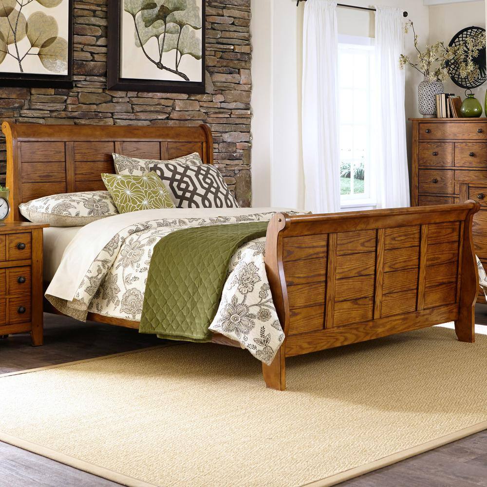 Back. Liberty Furniture Industries - Grandpas Cabin King Sleigh Bed in Aged Oak - Brown.