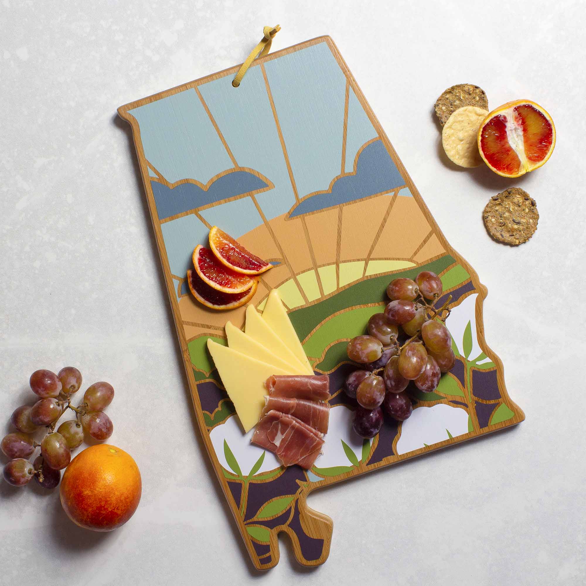 Angle. Totally Bamboo - Alabama Cutting Board with Artwork by Summer Stokes.