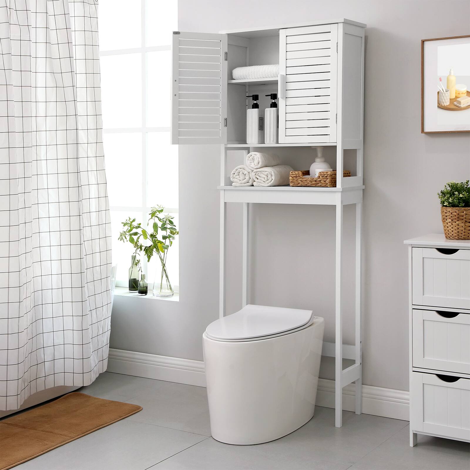 Left. Songmics Home - Over The Toilet Storage Cabinet, Bathroom Cabinet with Adjustable Inside Shelf and Bottom Stabilizer Bar - Cloud White.