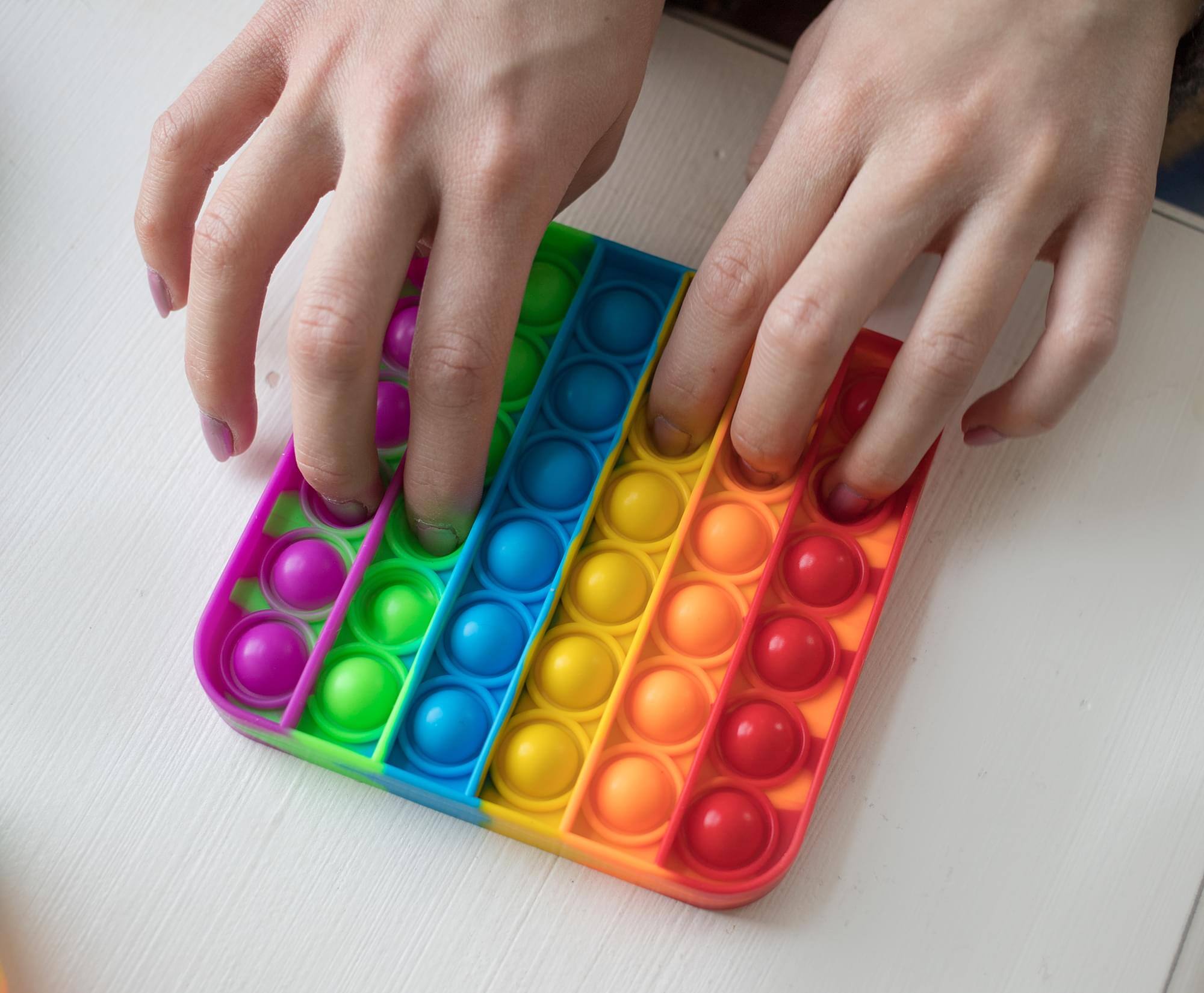 Alt View 2. Toynk - Pop Fidget Toy Silicone Bubble Popping Game | Rainbow Square - Multi-Color.