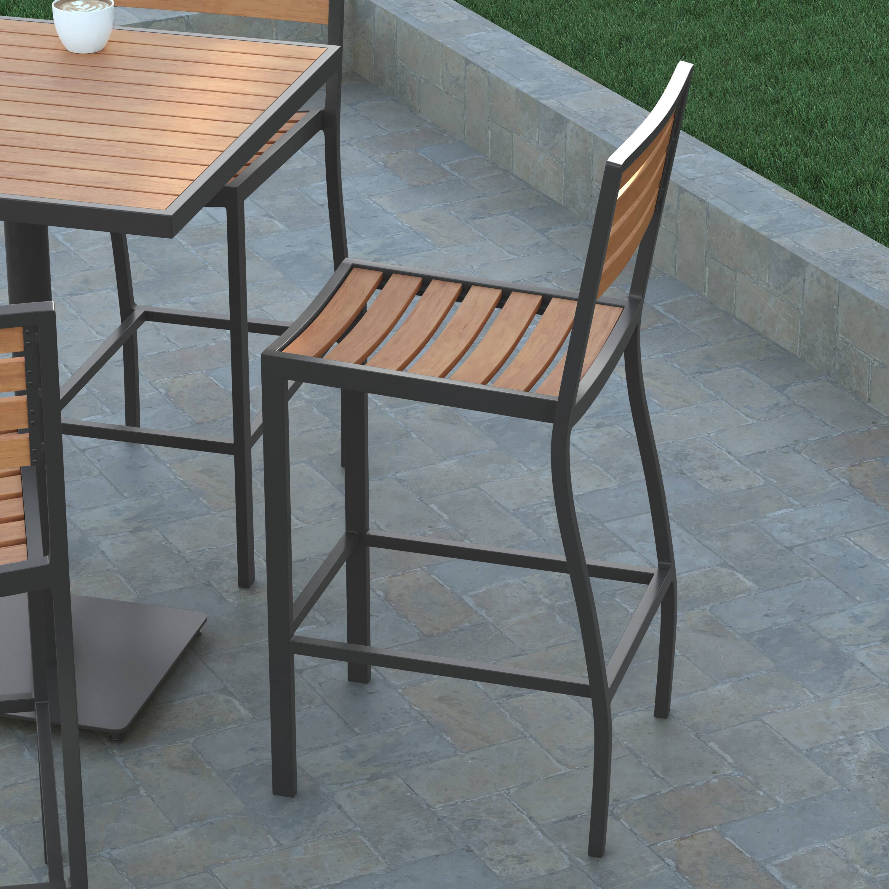 Alt View 3. Emma + Oliver - Livia All-Weather Armless Bar Height Dining Stool with Polyresin Slats and Aluminum Frame - Teak.