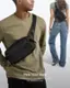 Pick Your Way In the back or on your chest, switch with the adjustable strap.