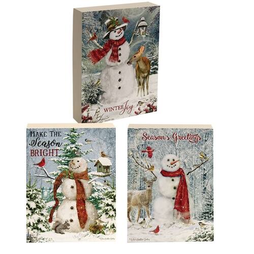 Sure, here is the corrected and grouped text:

---

**Front of the Box:**
- "A WINTER JOURNEY"

**Left Card:**
- "MAKE THE SEASON BRIGHT"

**Right Card:**
- "Season's Greetings"

---