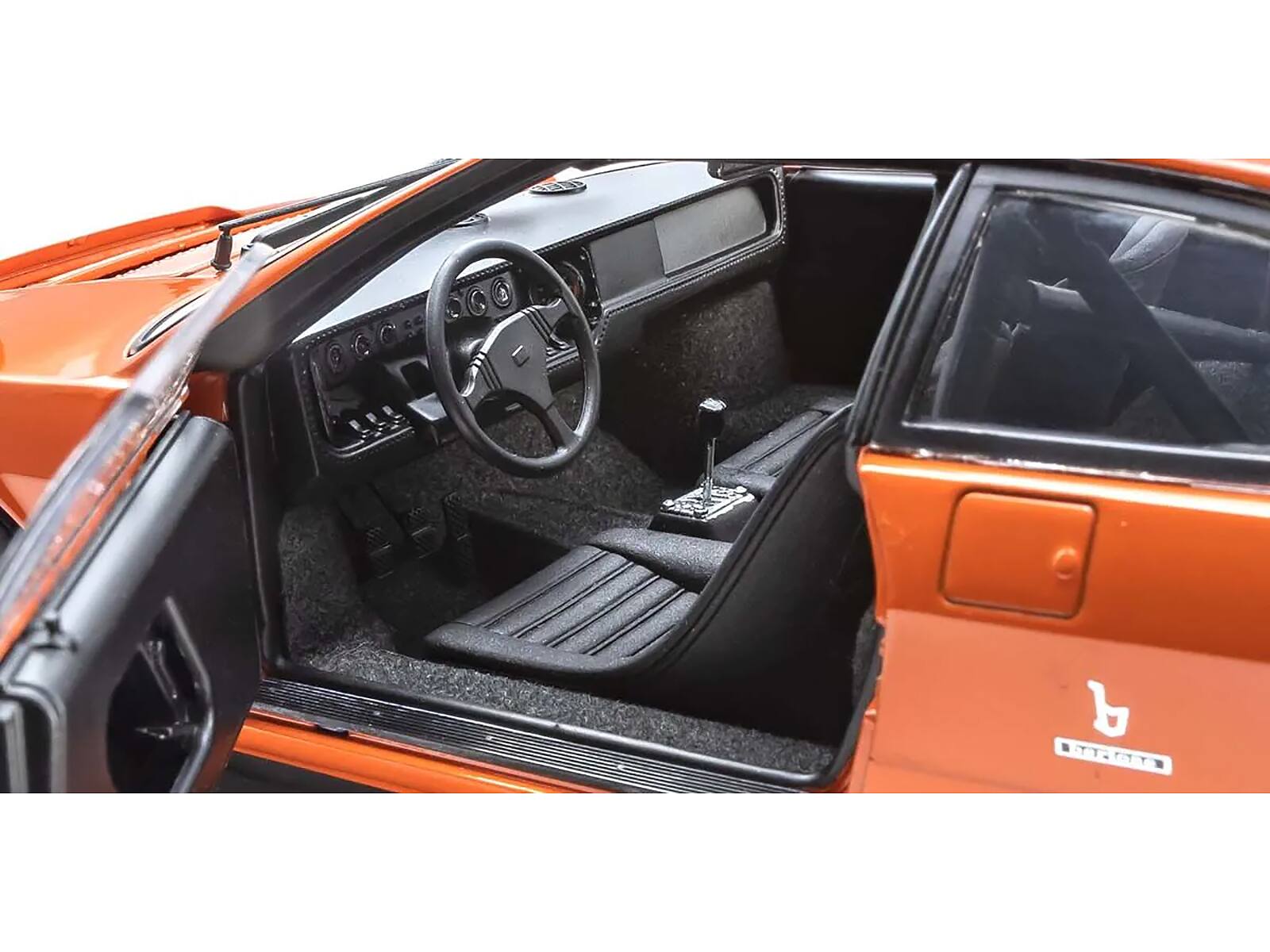 Left. Kyosho - Lamborghini Urraco Rally Orange 1/18 Diecast Model Car by Kyosho - Orange.