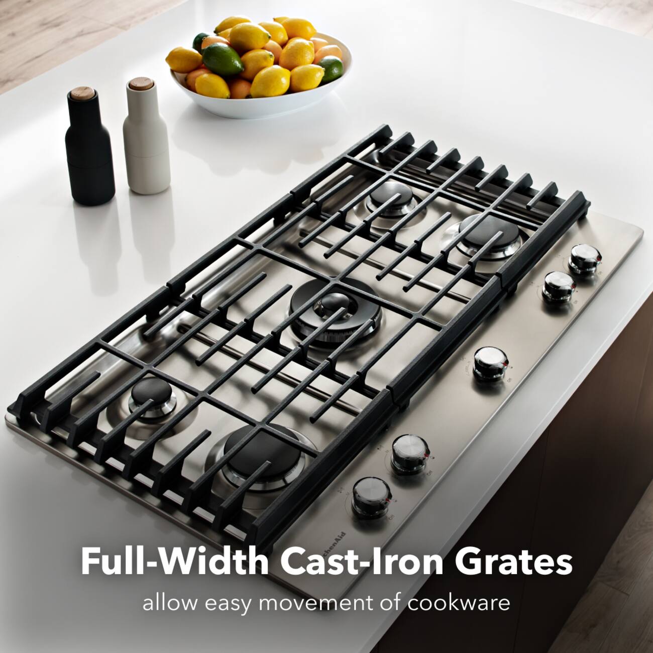 Full-Width Cast-Iron Grates allow easy movement of cookware