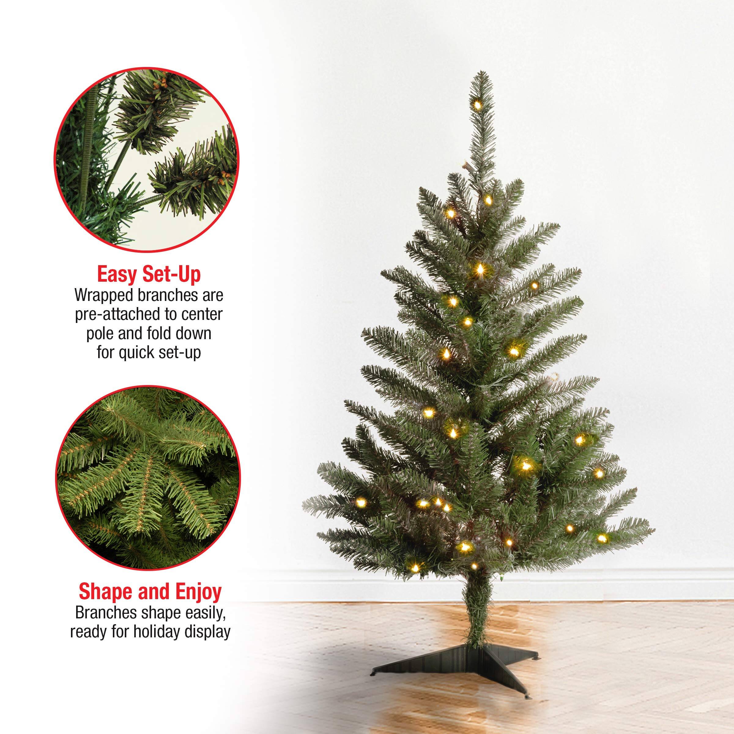 Easy Set-Up  
Wrapped branches are pre-attached to center pole and fold down for quick set-up  

Shape and Enjoy  
Branches shape easily, ready for holiday display