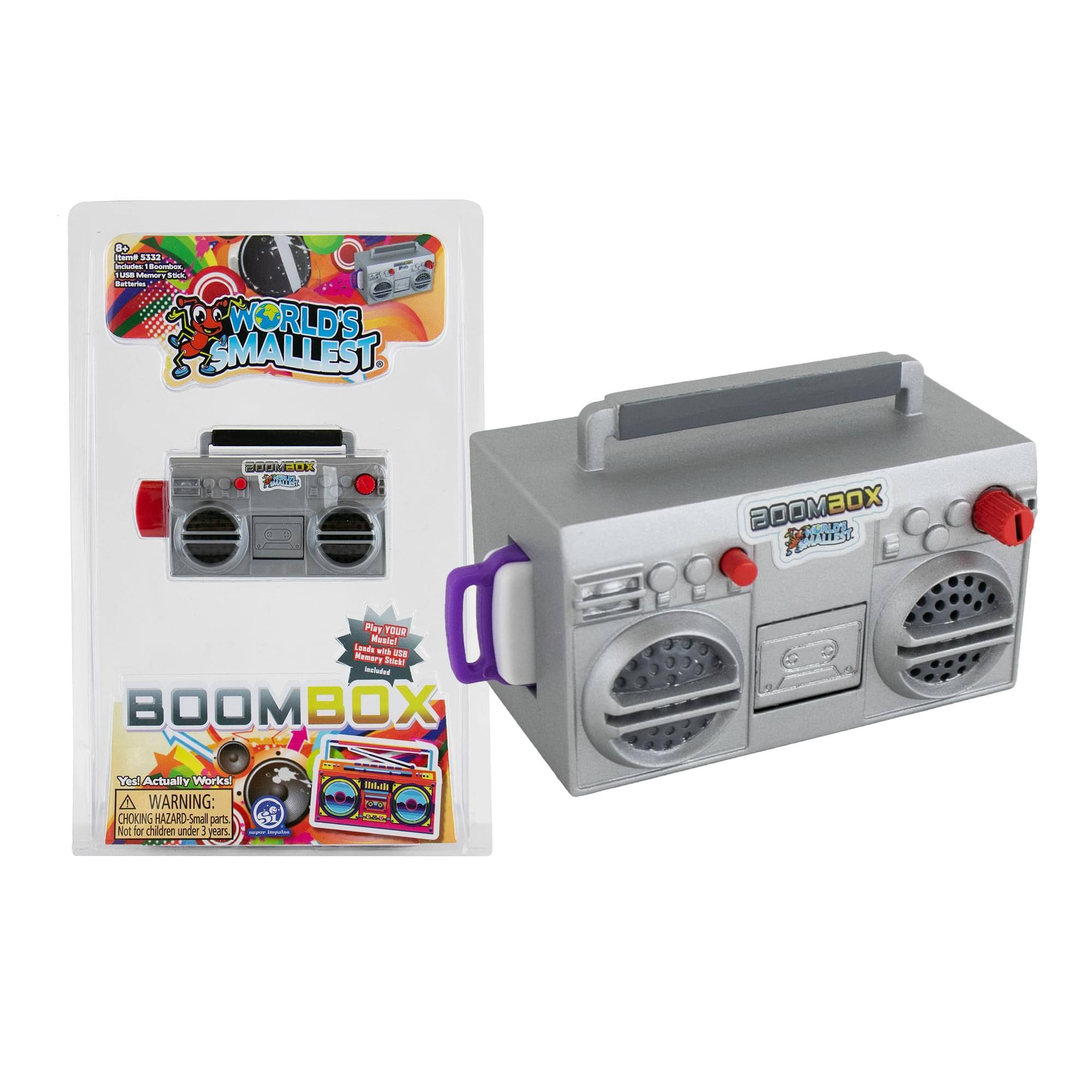 G 5AS2 - TUE F Surtan 1 WORLD'S SMALLEST BOOMBOX MANUAL Play Your Music! Lesds - Remery Tenhl Infoted BOOMBOX 1 Ves Actually Works! - A WARNING: T CHOKING HAZARD Small parts Not for children under 3 years.