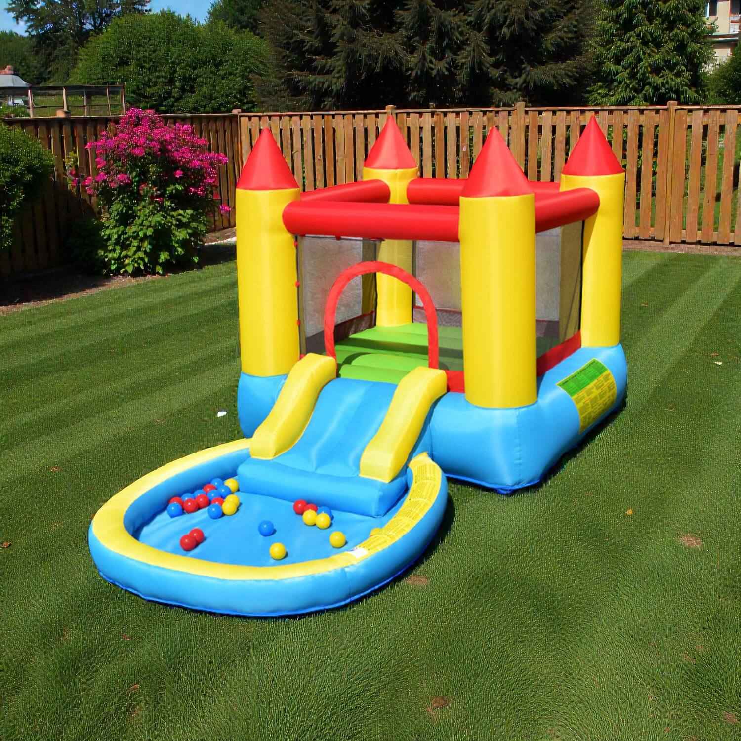 Front. BreeBe - Children’s Jumping Castle with Slide and 580W Air Pump - Multicolor.