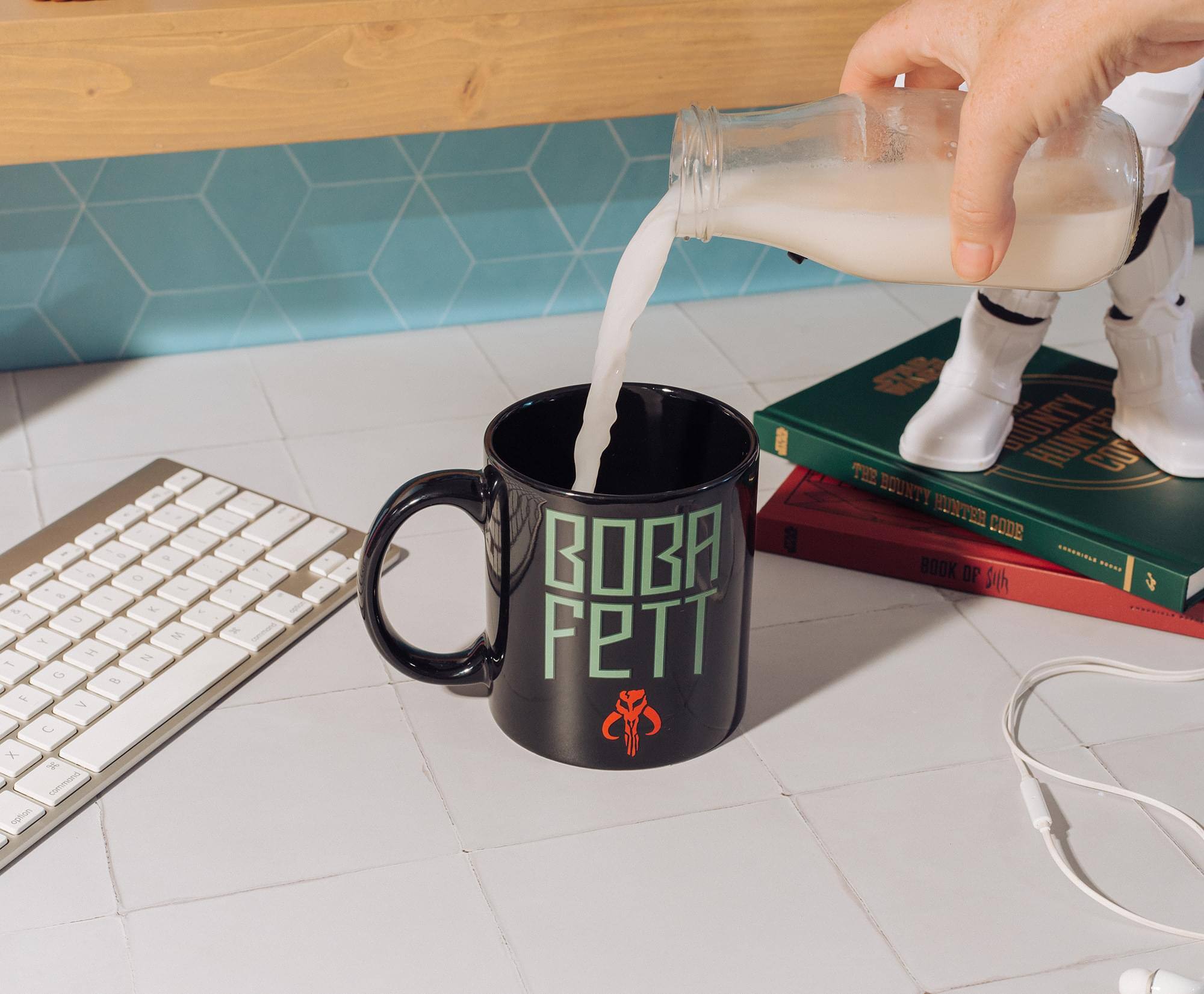 - I - O - - - - of  - - M I I 1 1 2  7 U X J Uo rption N BOBA FETT  DOUNTY CO THE BOUNTY HUNTER CODE CIE BOOK ..... OP Silh

Corrected text:
- I - O - - - - of  - - M I I 1 1 2  7 U X J Uo rption N BOBA FETT  THE BOUNTY HUNTER CODE BOOK ..... OP Silh