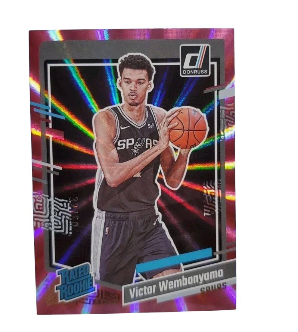 DONRUSS  
Self.  
SPURS  
3F  
CO  
E  
10  
i  
3.275.0  
RATED ROOKIE  
Victor Wembanyama  
SPURS