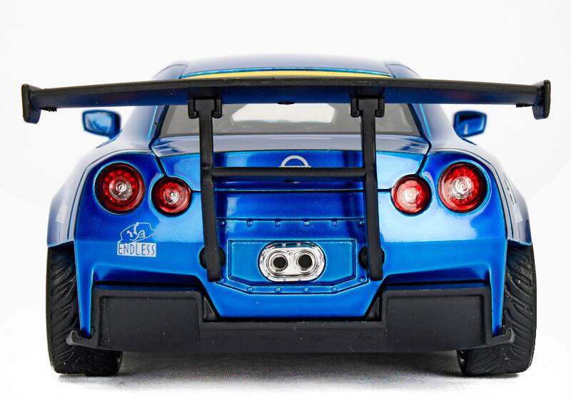 Back. Jada - 2009 Nissan GT-R (R35) Ben Sopra Blue JDM Tuners 1/24 Diecast Model Car  by Jada - Blue.