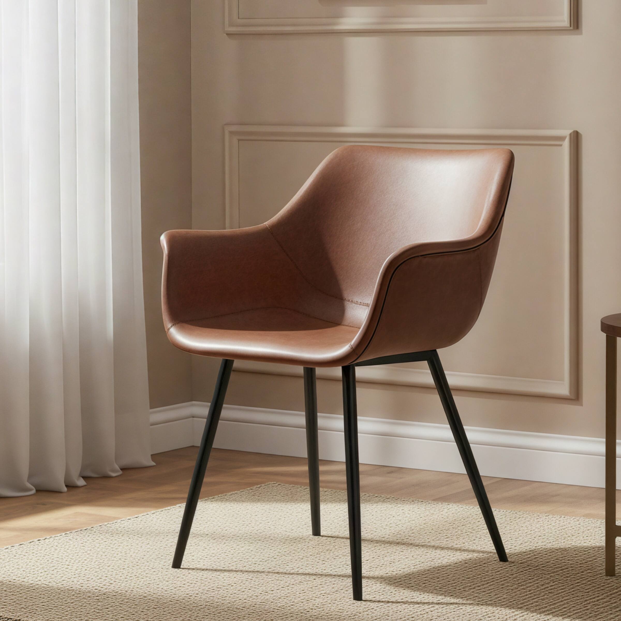Angle. LeisureMod - Markley Modern Distressed Leather Dining Chair with Iron Legs - Light Brown.