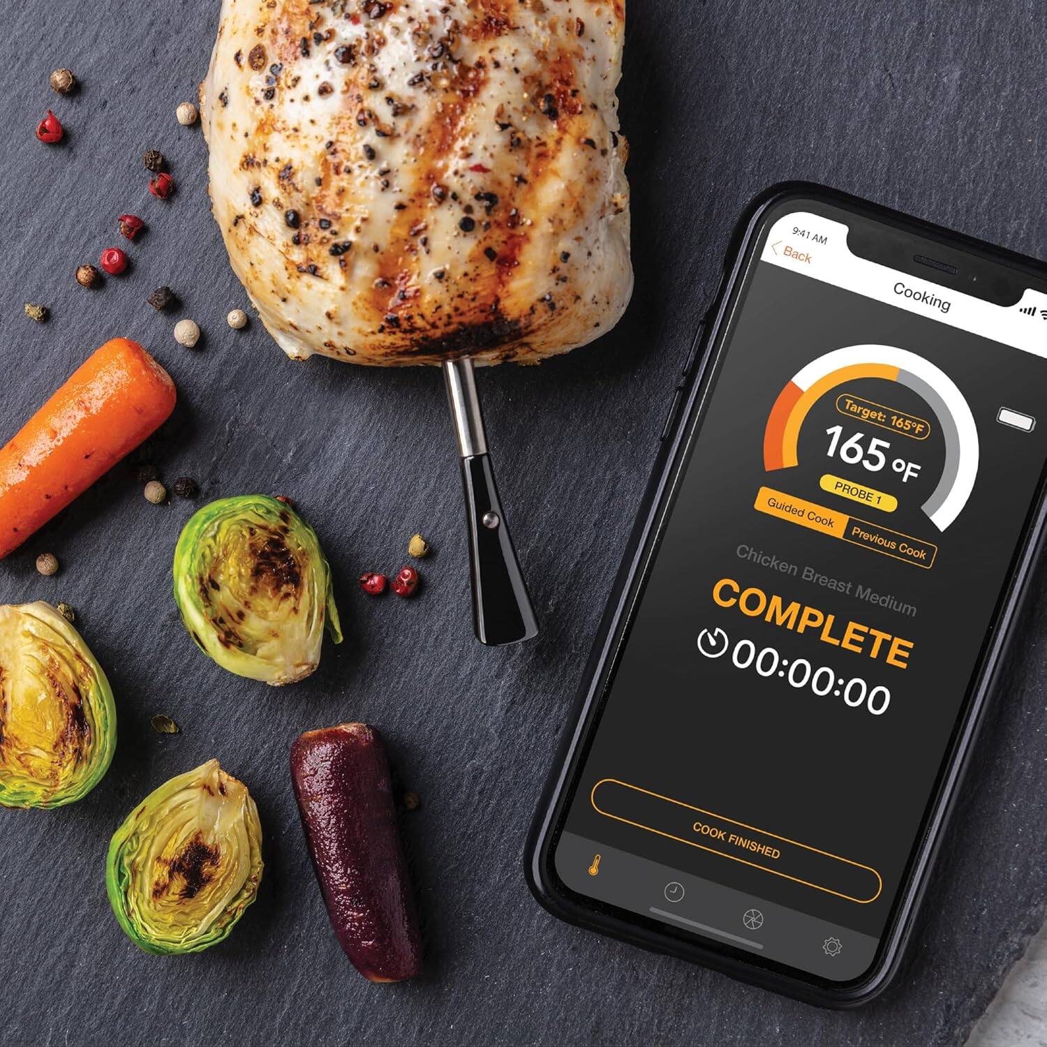 9:41 AM  
Back  
Cooking  
Target: 165°F  
165°F  
PROBE 1  
Guided Cook  
Previous Chicken Cook  
Chicken Breast Medium  
COMPLETE  
00:00:00  
COOK FINISHED