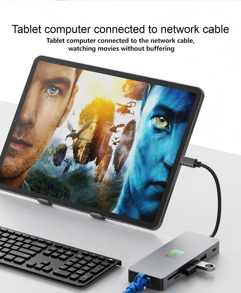 Tablet computer connected to network cable  
Tablet computer connected to the network cable, watching movies without buffering