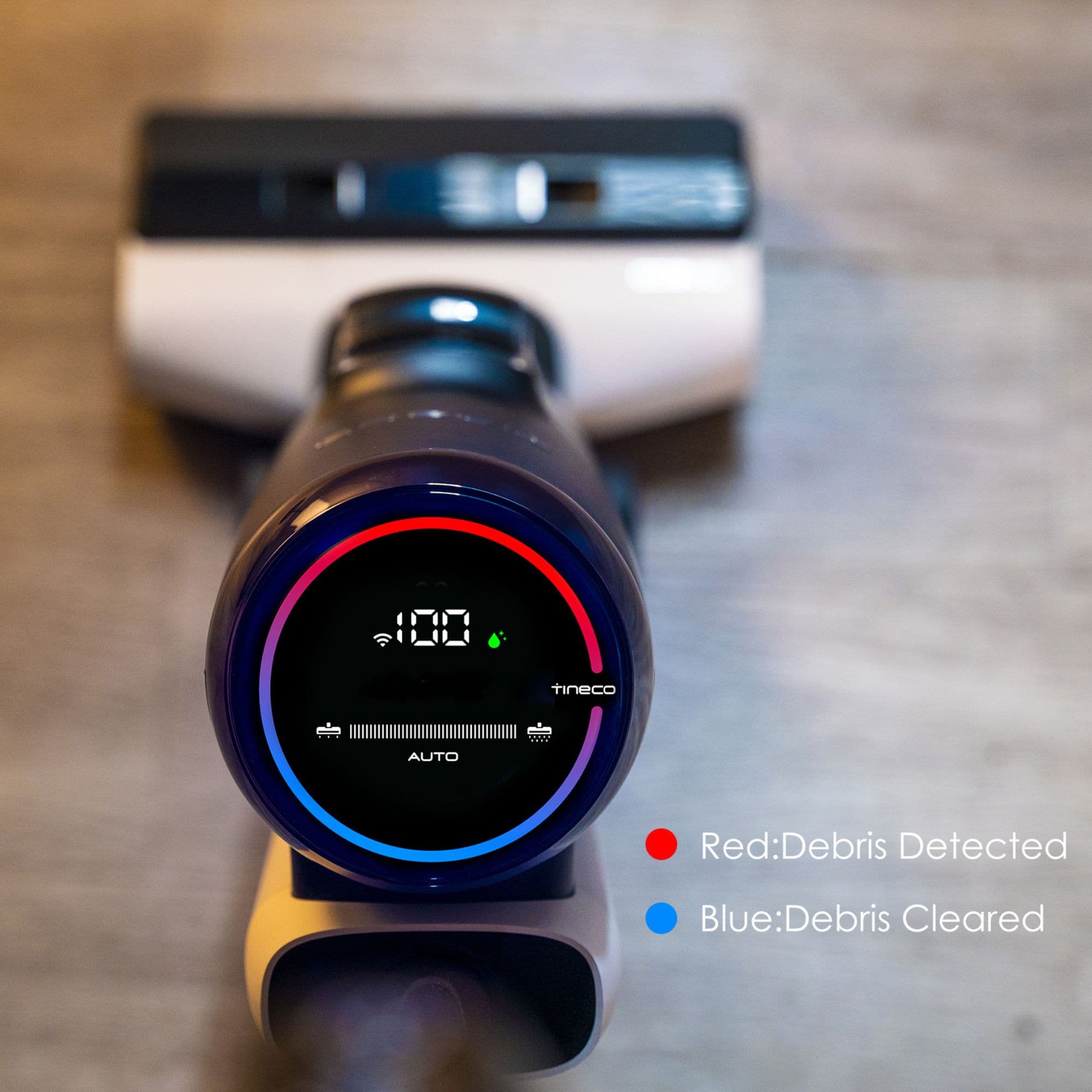 The text on the image reads: "100 tineco d d.. AUTO Red: Debris Detected Blue: Debris Cleared."