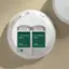 "Chamomile Mint" is written on the image, indicating that the two white containers hold Chamomile Mint refills.