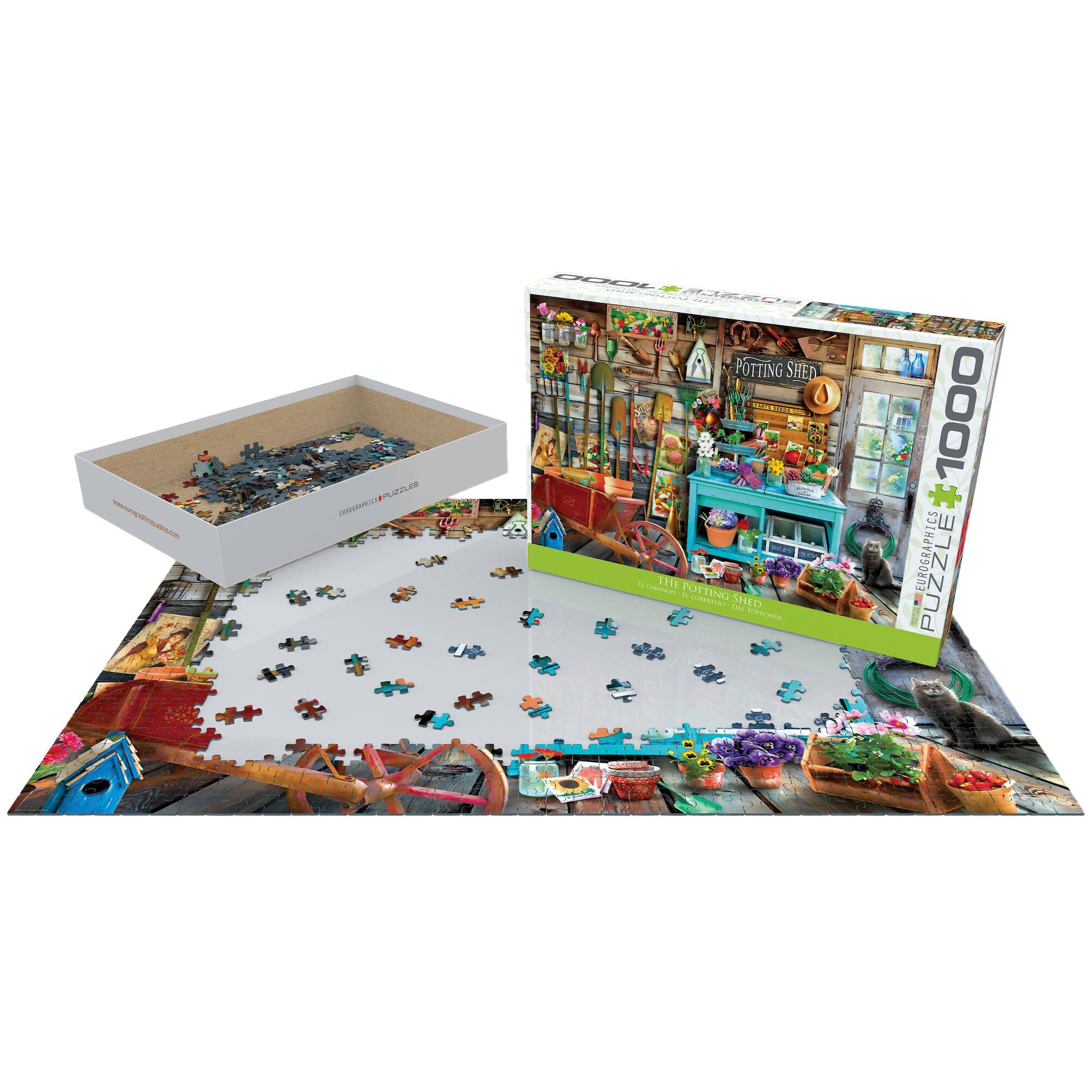 * Les Immen - Potting Shed puzzle - 1000 piece Eurographic puzzle -

The image features a puzzle box with a puzzle inside, which is a 1000 piece Eurographic puzzle. The puzzle is a depiction of a Potting Shed. The puzzle box is placed on a table, and the puzzle is ready to be assembled.